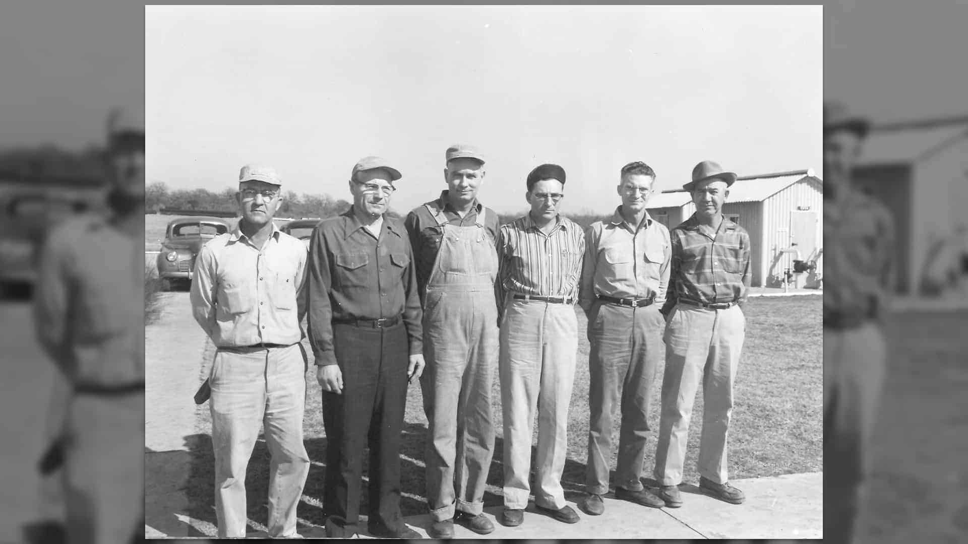 Team members gathered together outside the Edmond Station (March, 1960)