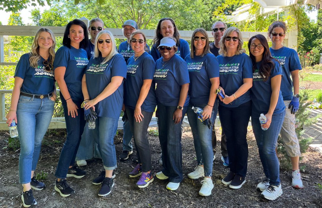 Group of volunteers posing for a photo